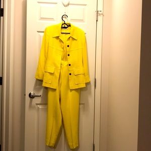 Yellow suit , jacket and pants .